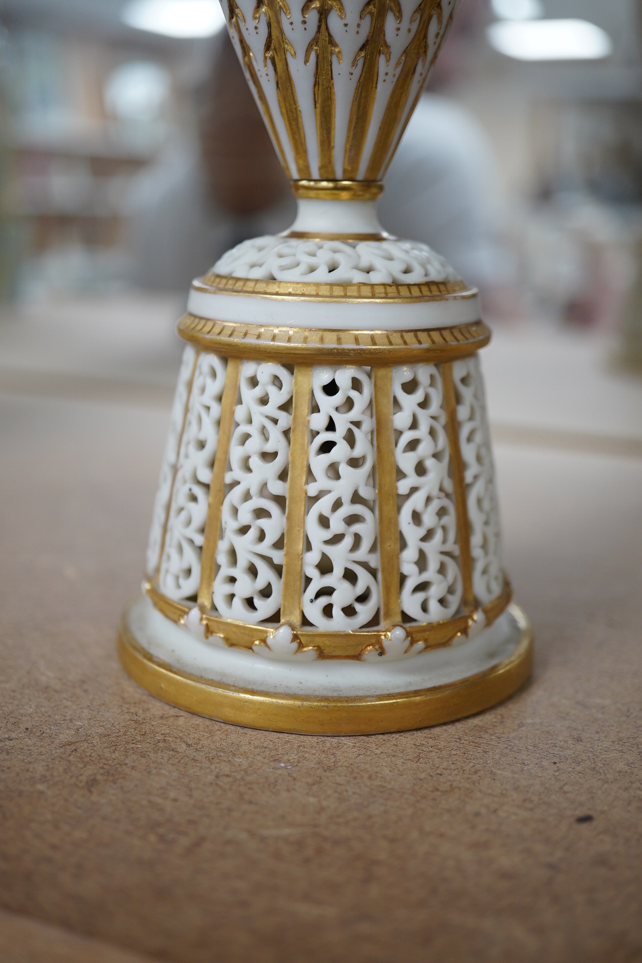 A Grainger's reticulated posy vase with gilded decoration, 29cm high. Condition - good